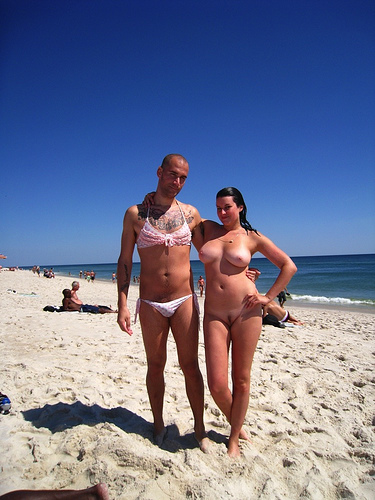 Naked Beach Couple Share One Microbikini - Swingers Blog image
